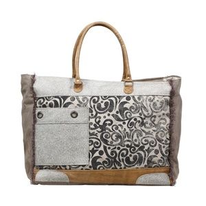HIDE AND FLORAL WEEKENDER BAG